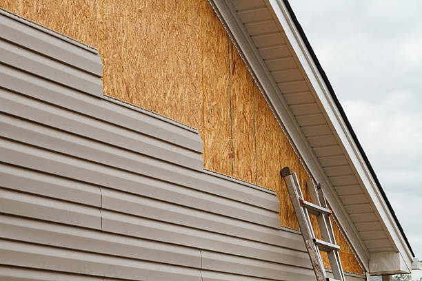 Professional Emergency Siding Repair technician working in Riverside, PA